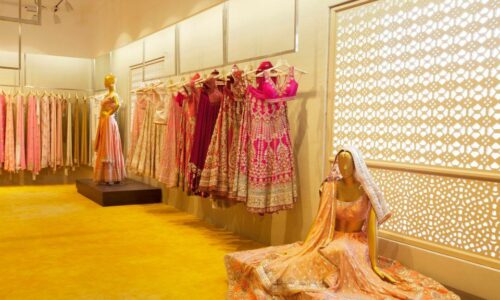 How do online stores in Dubai manage returns and exchanges for Indian dresses?